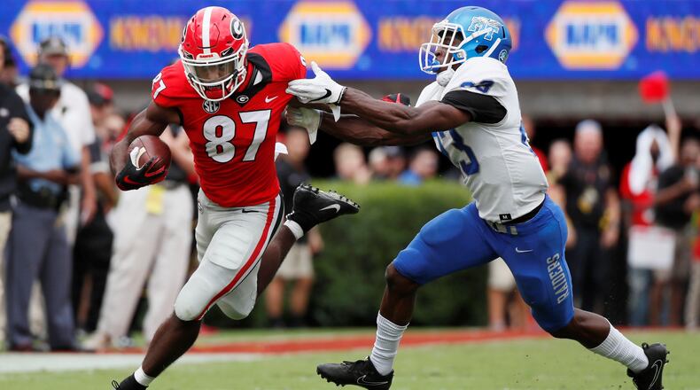 Georgia Bulldogs wide receiver Tyler Simmons (87) breaks free for a first half TD. The University of Georgia Bulldogs played the Middle Tennessee Blue Raiders in a NCAA college football game Saturday, Sept 15, 2018, at Sanford Stadium in Athens, GA. BOB ANDRES /BANDRES@AJC.COM