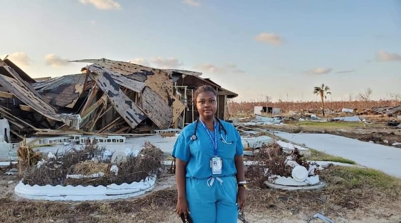 Dr. Shaneeta Johnson, a native of Nassau, is leading efforts in Atlanta to get medical and humanitarian supplies to the Bahamas. She is pictured there days after Hurricane Dorian devastated the area. CONTRIBUTED