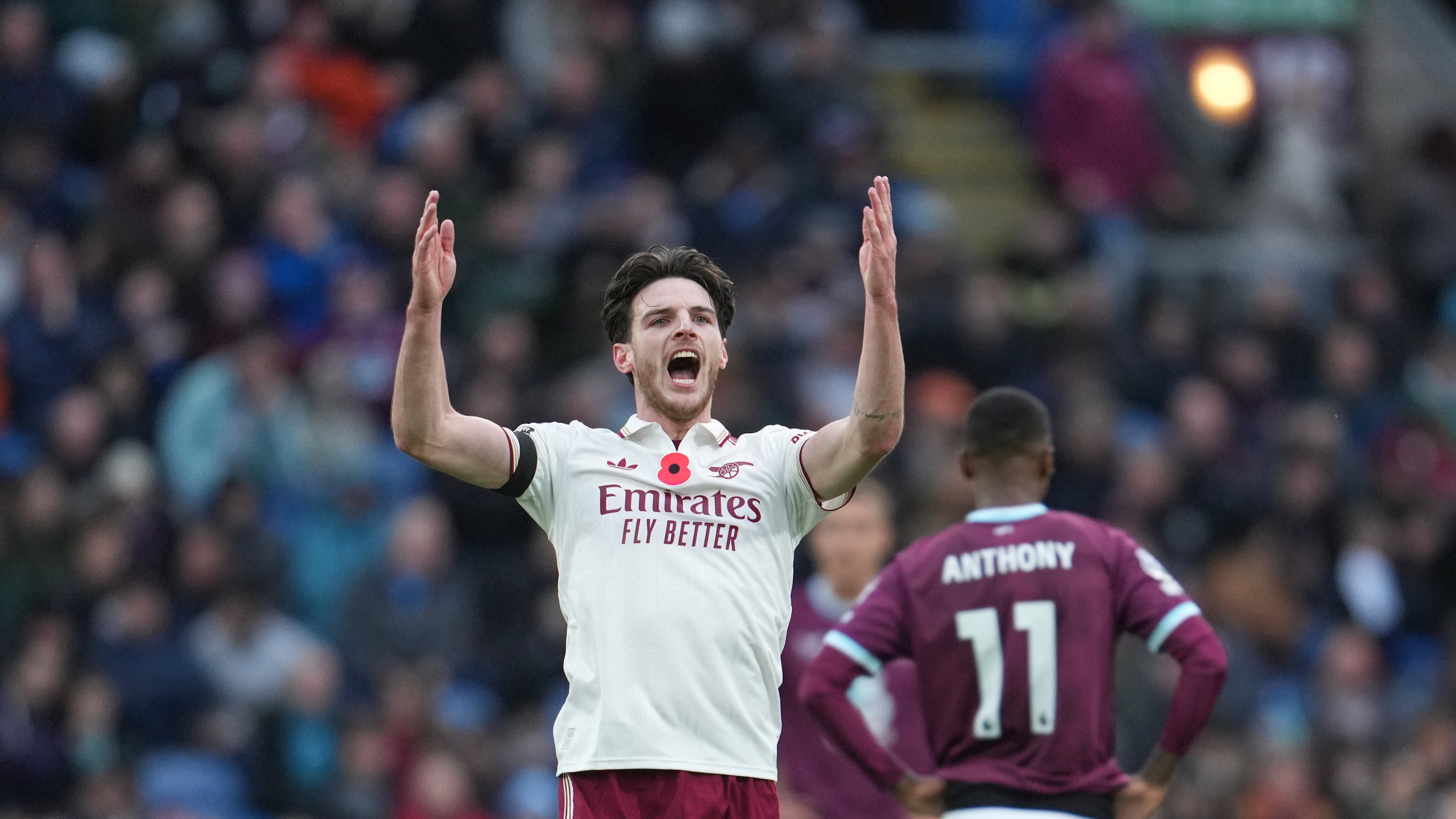 Arsenal's Declan Rice celebrates after scoring his side's second goal during the English Premier League soccer match between Burnley and Arsenal in Burnley, England, Saturday, Nov. 1, 2025. (AP Photo/Jon Super)