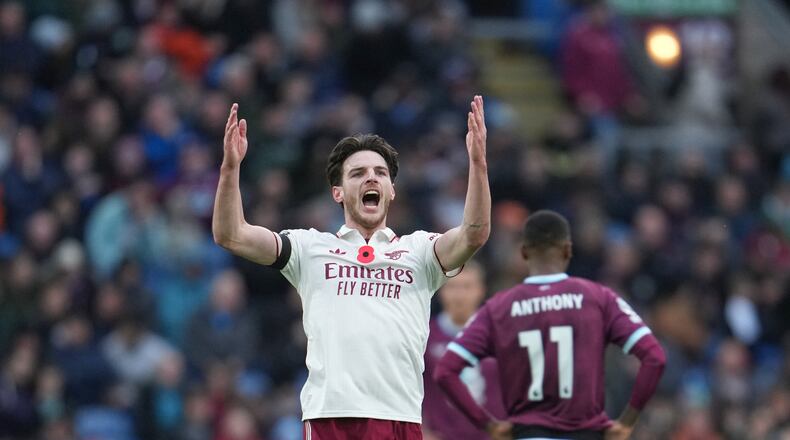 Arsenal's Declan Rice celebrates after scoring his side's second goal during the English Premier League soccer match between Burnley and Arsenal in Burnley, England, Saturday, Nov. 1, 2025. (AP Photo/Jon Super)