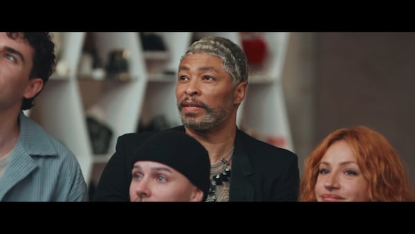 ATlanta resident Octavius Terry watches his model go down the runway during the first challenge of Season 22 of Freeform's "Project Runway." (Freeform/Disney+)