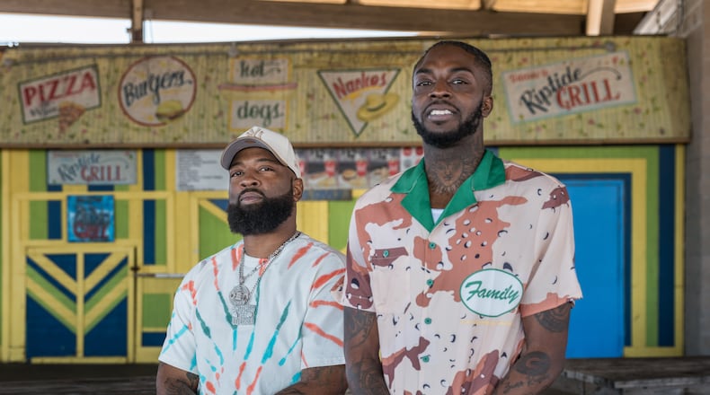 Orange Crush event organizers George Turner and Steven Smalls at the Tybee Pier on March 6, 2025 on Tybee Island, GA.(Justin Taylor/The Atlanta Journal-Constitution)