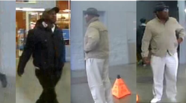 The Duluth Police Department is searching for two men (above) suspected of armed robbery.