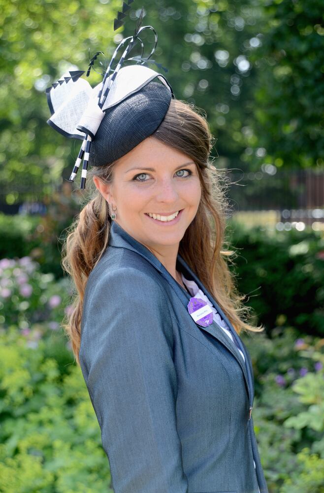 Race goers show hat styles