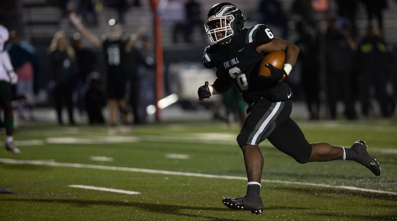 Collins Hill's Spenser Anderson (6) scores a touchdown during a GHSA high school football game between the Collins Hill Eagles and the Grayson Rams at Collins Hill High in Suwanee, GA., on Friday, December 3, 2021. (Photo/ Jenn Finch)