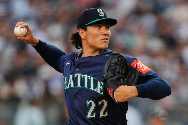 Seattle Mariners pitcher Bryan Woo (22) throws during the first inning of a baseball game against the New York Yankees, Thursday, July 10, 2025, in New York. (AP Photo/Yuki Iwamura)