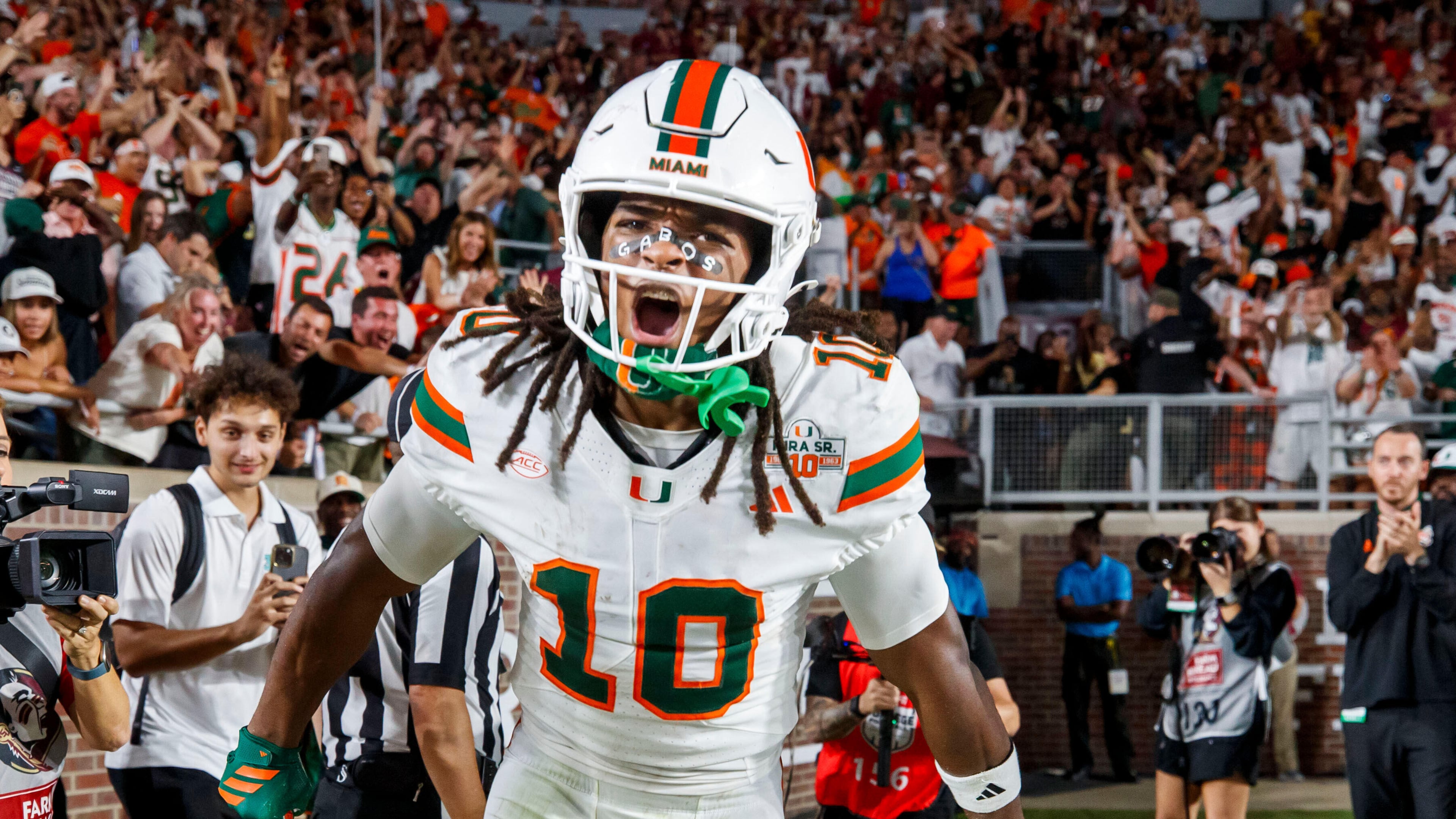 Miami wide receiver Malachi Toney (10) celebrates scoring a touchdown during the first half of an NCAA college football game, Saturday, Oct. 4, 2025, in Tallahassee, Fla. (AP Photo/Colin Hackley)