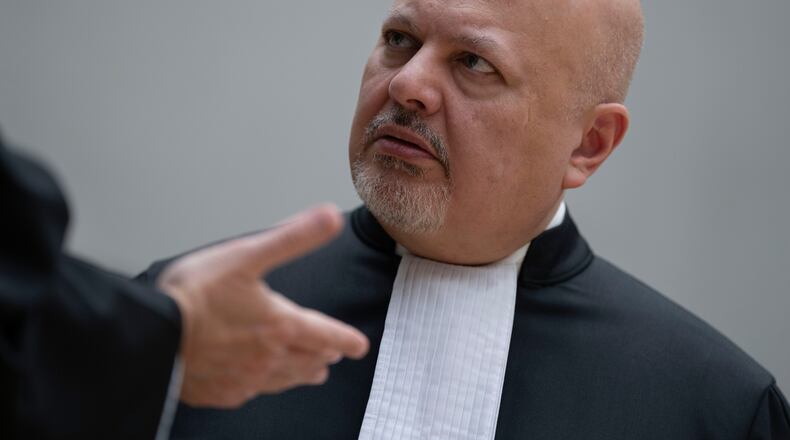 FILE - Chief Prosecutor Karim Khan talks before convening the International Criminal Court (ICC) in The Hague, Netherlands, March 14, 2025. (AP Photo/Peter Dejong, Pool, File)