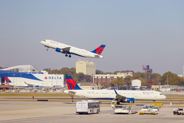 Delta Air Lines jets depart and arrive at Hartsfield-Jackson International Airport on Nov. 8, 2023. (Miguel Martinez/The Atlanta Journal-Constitution/TNS)
