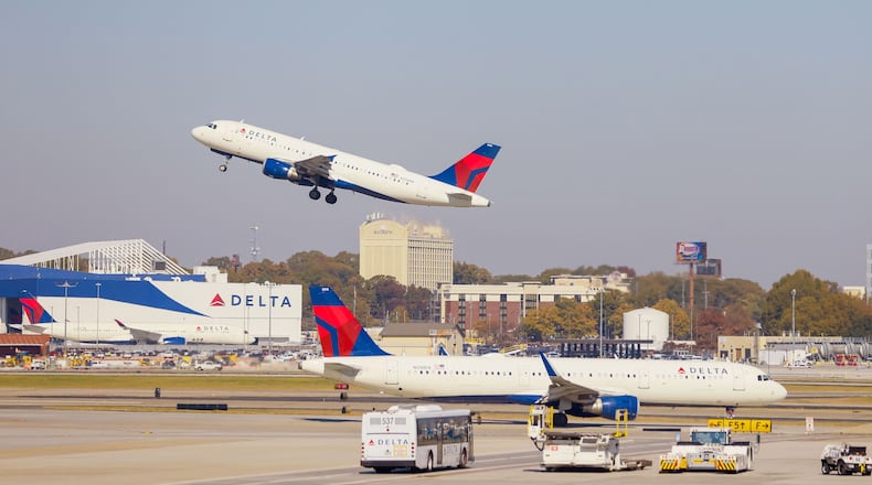 Delta Air Lines jets depart and arrive at tartsfield-Jackson International Airport on Nov. 8, 2023. (Miguel Martinez/The Atlanta Journal-Constitution/TNS)