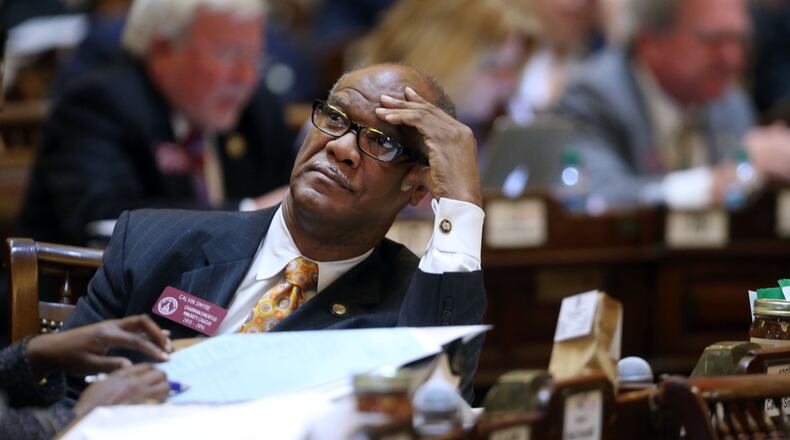 Rep. Calvin Smyre, D-Columbus, watches the voting board Monday as several Democrat bills were tabled or stalled by House Republicans.