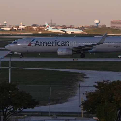 An American Airline plane is moving to a terminal at O'Hare International Airport in Chicago, Monday, Nov. 3, 2025. (AP Photo/Nam Y. Huh)