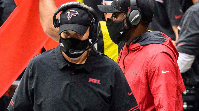 Falcons coach Dan Quinn walks the sideline against the Chicago Bears, Sunday, Sept. 27, 2020, in Atlanta. The Chicago Bears won 30-26. (Danny Karnik/AP)