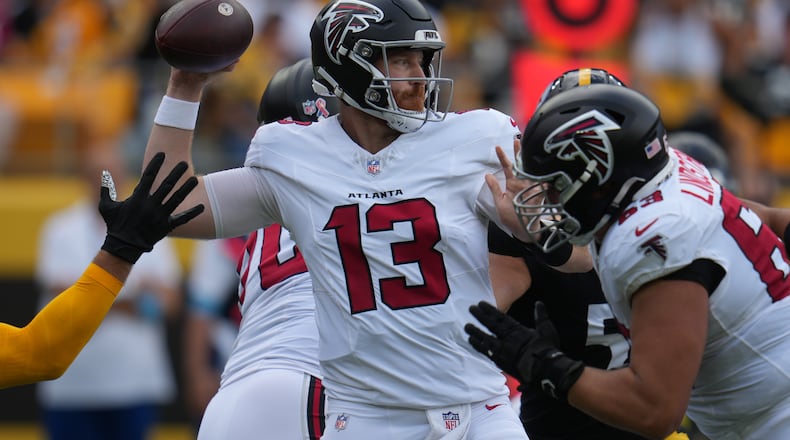 Atlanta Falcons quarterback Cooper Rush looks to pass during an NFL football game against the Pittsburgh Steelers, Sunday, Sept. 13, 2026, in Pittsburgh. (Gene J. Puskar/AP)