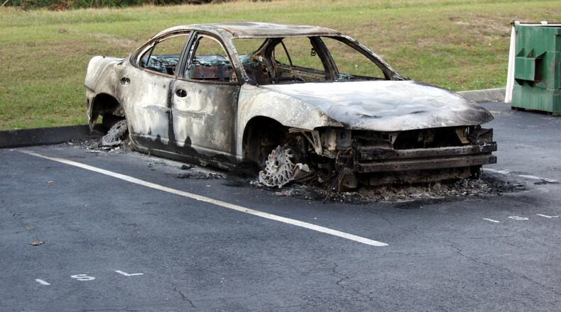 Two homeless men in California pulled an unconscious driver from a burning car.