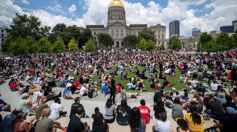 Hundreds of participants of the "OneRace Movement" listen to leaders inside Liberty Plaza, across the street form the Georgia State Capitol building, as they call for a biblical response of justice in Atlanta, Friday, June 19, 2020. The group marched from Centennial Olympic Park to the State Capitol building.