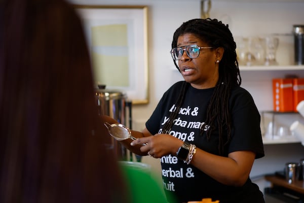 Brandi Shelton, owner of Just Add Honey, at her tea shop on Tuesday, April 22, 2025. (Miguel Martinez/AJC)