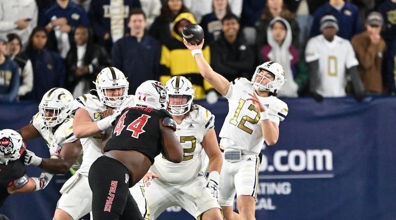 Georgia Tech quarterback Aaron Philo (12) throws a pss during the second half of an NCAA college football game at Georgia Tech's Bobby Dodd Stadium, Thursday, November 21, 2024, in Atlanta. Georgia Tech won 30-29 over North Carolina State. (Hyosub Shin / AJC)