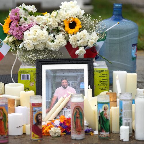 A memorial grows at the site where Lorenzo Salgado Araujo was fatally shot by ICE agents, last week, on Monday, July 13, 2026, in Houston. (AP Photo/Karen Warren)