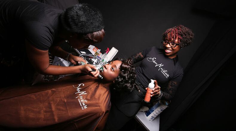 Behind the scenes at the Korto Momolu Fall 2014 fashion show presented by SheaMoisture in New York City.
(Photo by Bennett Raglin/Getty Images for SheaMoisture)