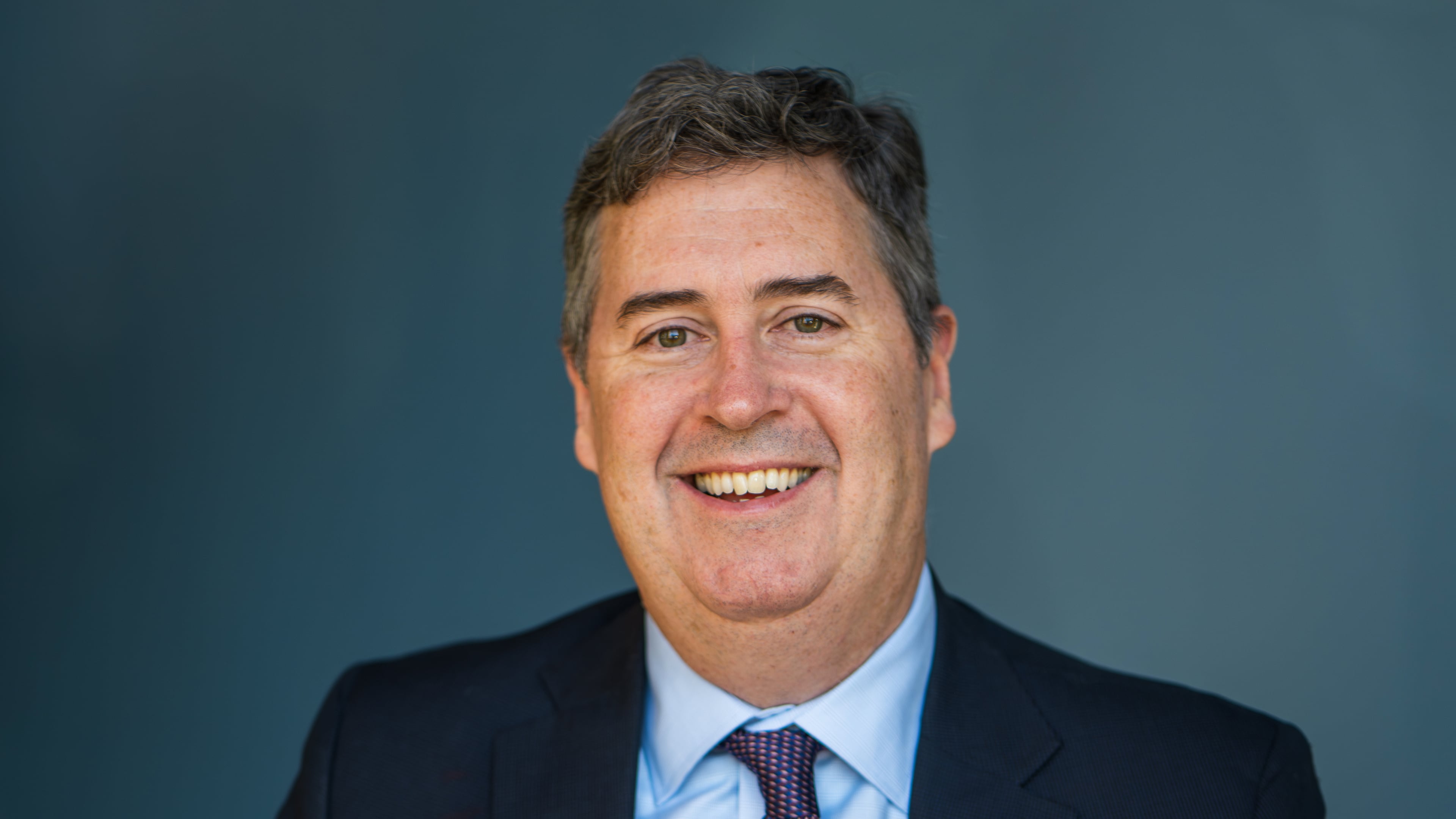 This photo provided by Joel Brennan's campaign shows Democratic candidate for Wisconsin governor Joel Brennan posing for a portrait in Milwaukee, Nov. 14, 2025. (Joel Brennan for Governor campaign via AP)