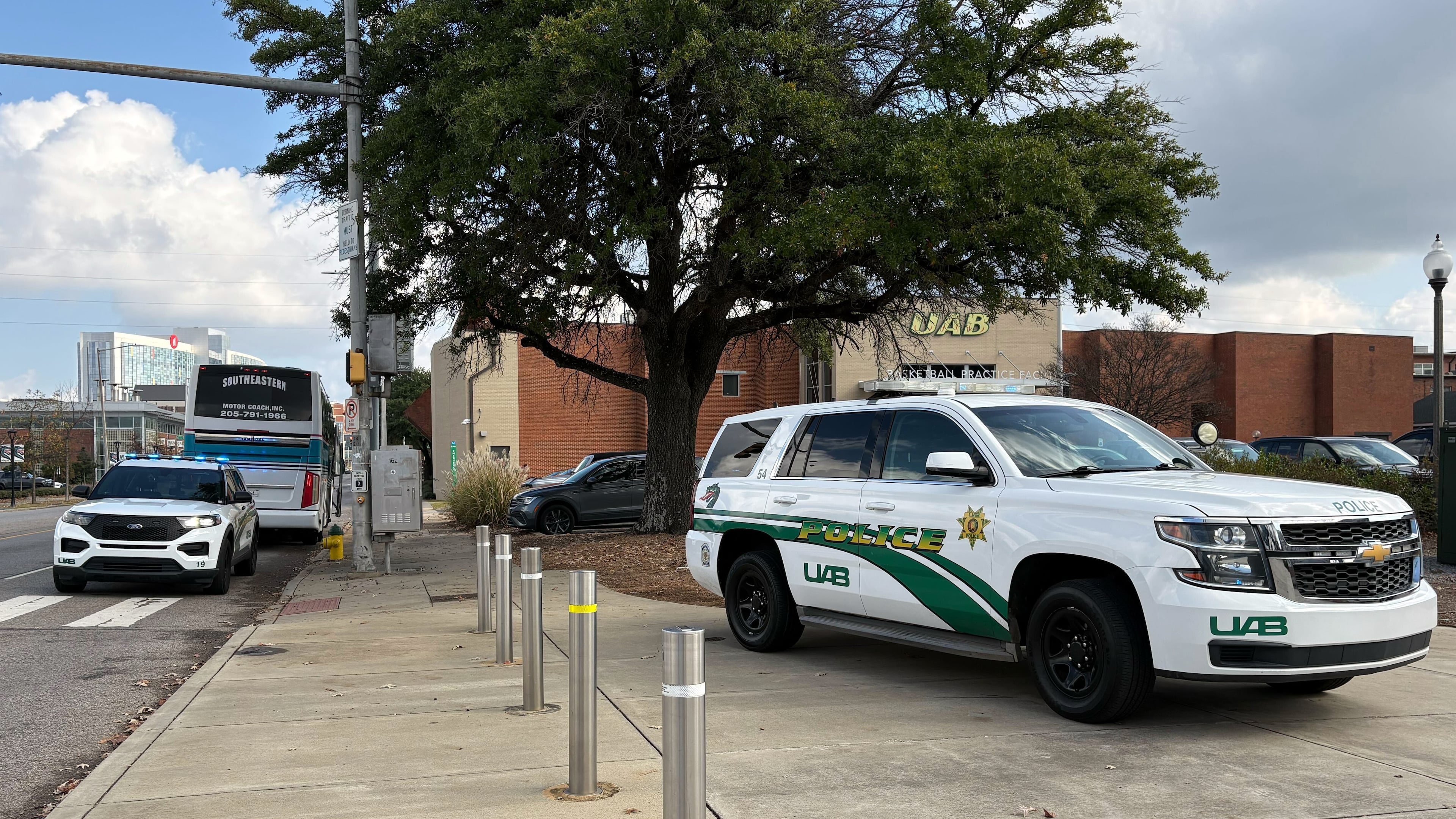 University of Alabama at Birmingham police attend to the scene of a stabbing Saturday, Nov. 22, 2025, at the campus Football Operations Center in Birmingham, Ala. (Diane Mwai/al.com via AP)