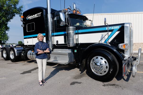 Bennett Family of Companies CEO Marcia Taylor stands in front of a company truck at the headquarters in McDonough, Ga. on Friday, June 12, 2026. (Estela Muñoz/AJC)