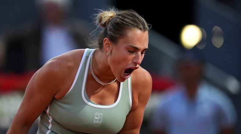 Aryna Sabalenka of Belarus celebrates a point during her match against Hailey Baptiste of the U.S. during the Madrid Open tennis tournament in Madrid, Tuesday, April 28, 2026. (AP Photo/Manu Fernandez)