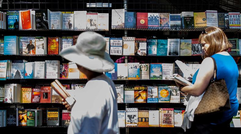 People visit a booth during the 12th Annual AJC Decatur Book Festival in 2017. BRANDEN CAMP/SPECIAL