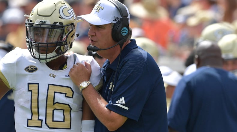 Georgia Tech head coach Paul Johnson instructs Georgia Tech quarterback TaQuon Marshall (16) in the second half Saturday, Sept. 29, 2018, at Bobby Dodd Stadium in Atlanta.