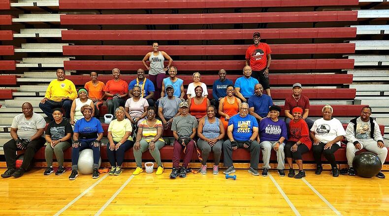 Leon Nolton Sr. stands in the back on the right in a photo of his early morning seniors group boot campers class from Beulah Baptist Church Family Life Center that was taken in November. Listed as follows: Row 1, L/R: Robert, Eddie, Audrey, Carolyn C., Vanessa, Holley, Harriett W., Michael, Sara, Carolyn B., Marilyn, Brandon; Row 2. L/R :Jacqueline, Maxine, Sam, Carolyn S., Roz, Bobbie, Jerry; Row 3. L/R : Arthur, Harriett B., Maxine, Eric, Walter, Sara, Ronald, James; Row 4. Standing: Instructors Kristie Hubbard and Leon Nolton Sr. (Photo contributed by Leon Nolton Sr.)