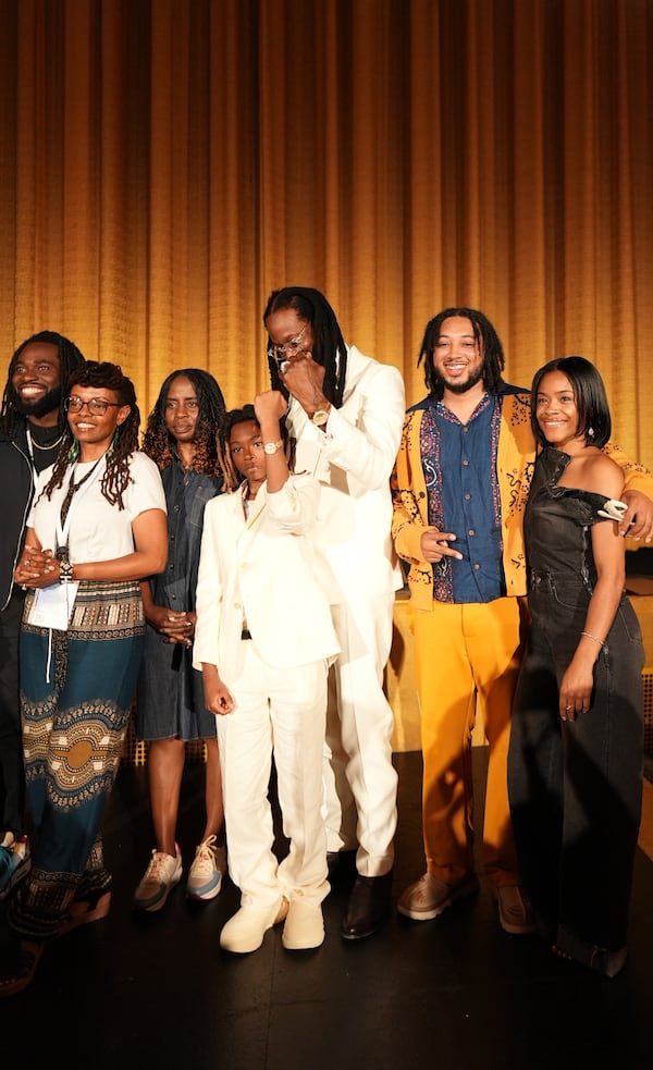 2 Chainz (center) and his son, Halo, wore matching white suits to the Atlanta Film Festival screening of 2 Chainz' short film "Red Clay" on Saturday, May 3, 2025 at the Plaza Theatre. They took the stage with other indie filmmakers, such as "Red Clay" director Christian Nolan Jones (second from right) and producer Sade Wilkins (far right) during a Q&A following the screening. (Courtesy of Shaddai Peña)