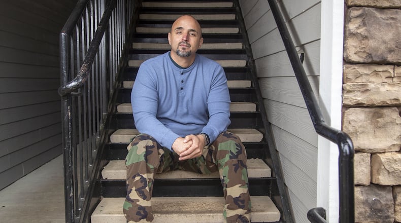 Alex Alvarado, case manager at NSPIRE Outreach, Inc., sits for a portrait at his residence in Lawrenceville, Friday, May 8, 2020. ALYSSA POINTER / ALYSSA.POINTER@AJC.COM