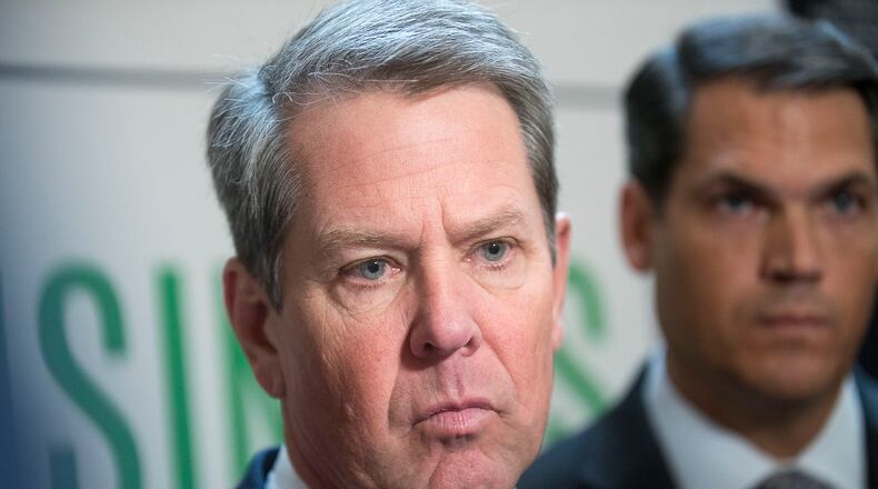 11/04/2019 -- Atlanta, Georgia -- Gov. Brian Kemp answers questions from the media following a press conference to announce a proposed limited expansion of Medicaid in Georgia while at the State Capitol building in Atlanta, Monday, November 4, 2019.  (Alyssa Pointer/Atlanta Journal Constitution)