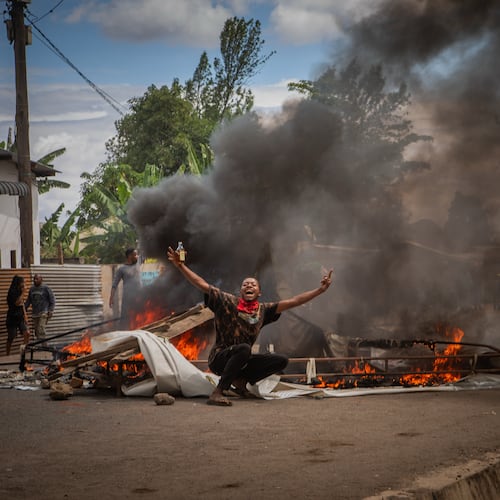 People protest in the streets of Arusha, Tanzania, on election day Wednesday, Oct. 29, 2025. (AP Photo/str)