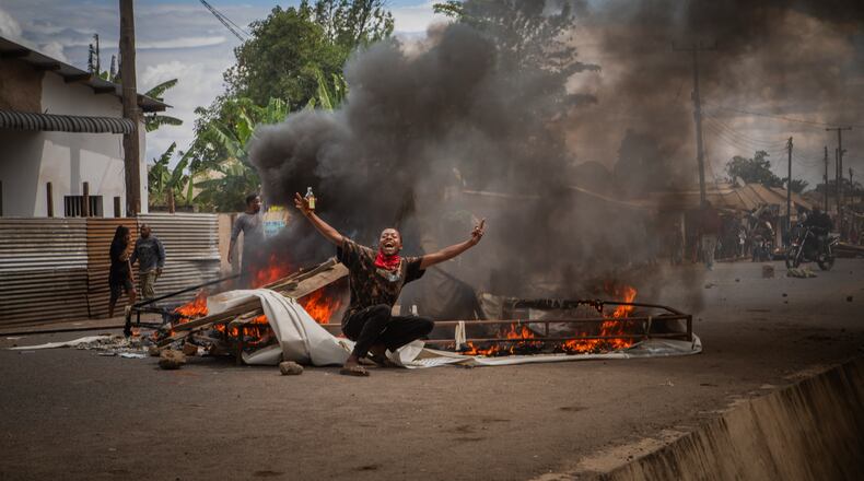 People protest in the streets of Arusha, Tanzania, on election day Wednesday, Oct. 29, 2025. (AP Photo/str)