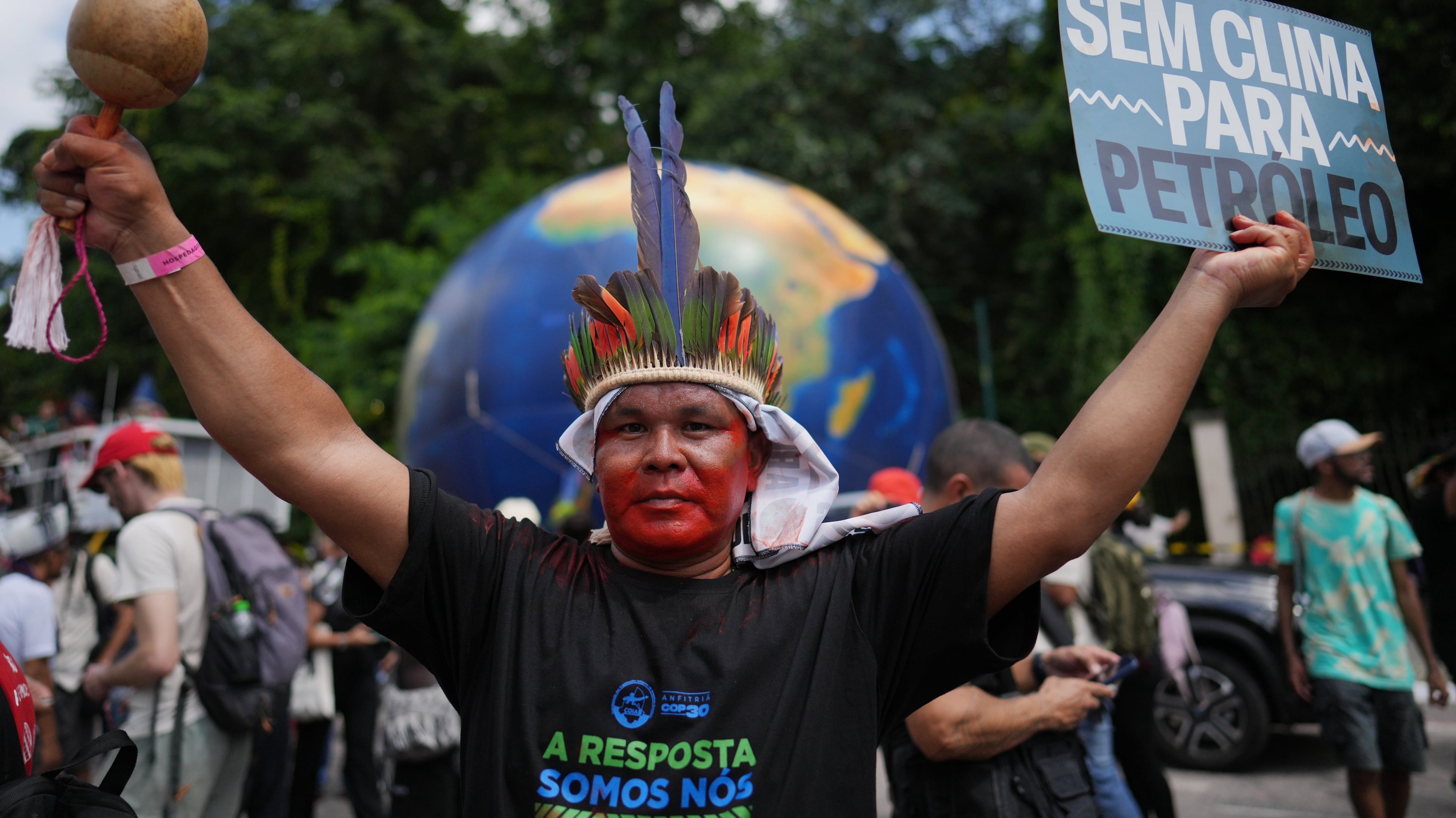 Indigenous activists participate in a climate protest during the COP30 U.N. Climate Summit, Monday, Nov. 17, 2025, in Belem, Brazil. (AP Photo/Andre Penner)