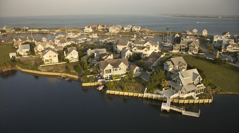 Three homes were destroyed in a massive fire on Bald Head Island in North Carolina.