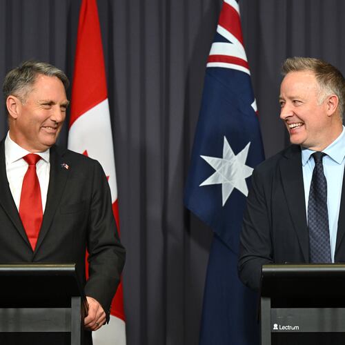 Australian Defense Minister Richard Marles, left, and Canada's Secretary of State Stephen Fuhr speak to the media after signing an agreement on export of an Over-the-Horizon Radar system at Parliament House in Canberra, Australia, Monday, June 22, 2026. (Lukas Coch/AAP Image via AP)