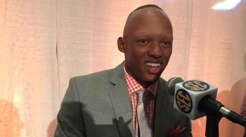 Tennessee quarterback Josh Dobbs talks to reporters at SEC Media Days in Hoover on Tuesday. the Alpharetta resident is an aerospace engineering major and one day hopes to design and build airplanes. He took over as the Vols’ starter with five games left in the season last year and led them to a 4-1 record in that span. (AJC / CHIP TOWERS)