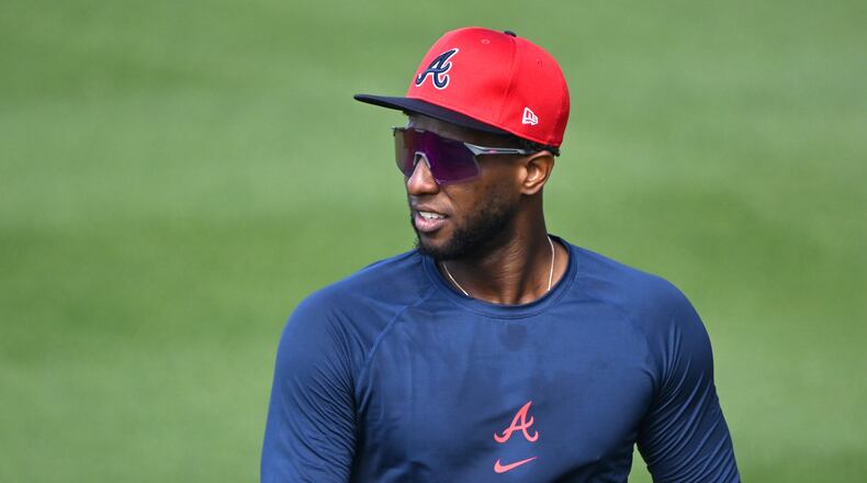 Atlanta Braves outfielder Jurickson Profar warms up on the baseball field during spring training workouts at CoolToday Park, Thursday, February 13, 2025, North Port, Florida. (Hyosub Shin / AJC)