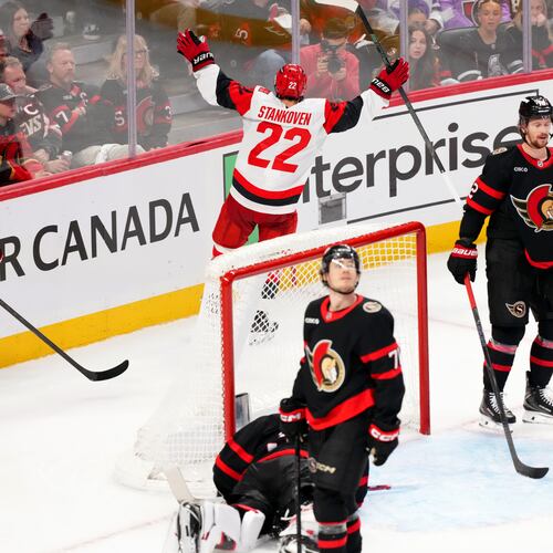 Carolina Hurricanes centre Logan Stankoven (22) celebrates his goal past Ottawa Senators goaltender Linus Ullmark (35) during the third period in Game 4 of a first-round NHL Stanley Cup playoff hockey series, Saturday, April 25, 2026, in Ottawa, Ontario. (Sean Kilpatrick/The Canadian Press via AP)