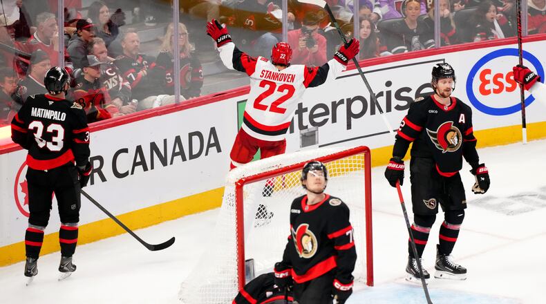 Carolina Hurricanes centre Logan Stankoven (22) celebrates his goal past Ottawa Senators goaltender Linus Ullmark (35) during the third period in Game 4 of a first-round NHL Stanley Cup playoff hockey series, Saturday, April 25, 2026, in Ottawa, Ontario. (Sean Kilpatrick/The Canadian Press via AP)