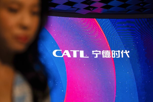 Signage of Contemporary Amperex Technology Co. (CATL) is displayed on the digital screen at the listing ceremony in Hong Kong, Tuesday, May. 20, 2025. (AP Photo/Chan Long Hei)