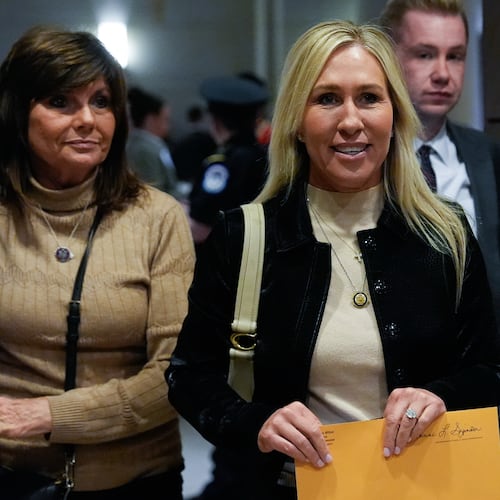 Rep. Marjorie Taylor Greene, R-Ga., departs a briefing on military strikes near Venezuela, Tuesday, Dec. 16, 2025, at the Capitol in Washington. (AP Photo/Julia Demaree Nikhinson)