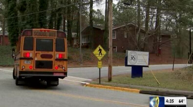 The Rise Schools suspended a student for five days after he recorded two other students in a bathroom stall with his cellphone, officials said.