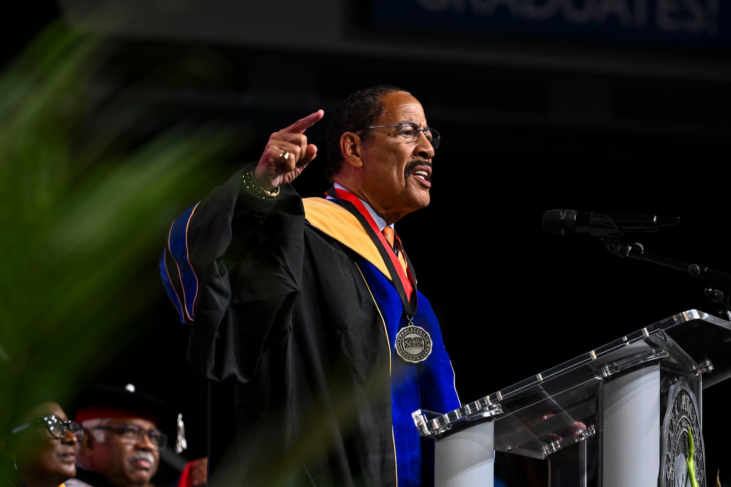 Dennis P. Kimbro, author, speaker, and tenured professor at Clark Atlanta, delivers the convocation address during the universities 2025 commencement ceremony Sunday, May 18, 2025 at Georgia State’s Convocation Center. (Daniel Varnado/For the Atlanta Journal-Constitution)