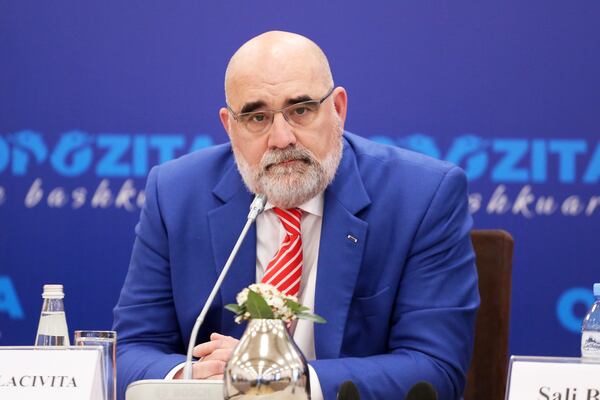 Chris LaCivita, who served as co-campaign manager of Donald Trump's successful 2024 presidential campaign, listens during a news conference with Sali Berisha, leader of Albania's main opposition center-right Democratic Party that he is consulting for in the upcoming May 11 parliamentary election, in Tirana, Albania, Feb. 10, 2025. (AP Photo)