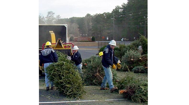 Christmas trees will be accepted 9 a.m. to 3 p.m. Saturday, Jan. 4, at a recycling event — like this one in Forsyth County — at the Home Depot at 5300 Windward Parkway, Alpharetta. KEEP FORSYTH COUNTY BEAUTIFUL