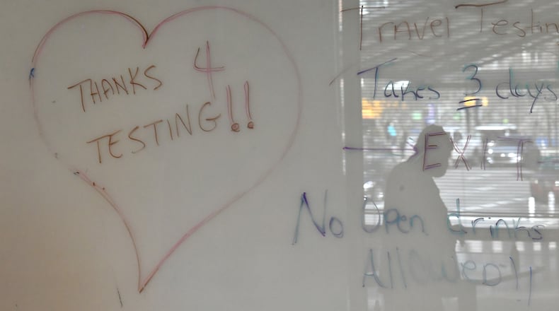 January 4, 2022 Atlanta - Georgia Tech students and employees are getting tested for COVID-19 at Georgia Tech’s Economic Development Building on Tuesday, January 4, 2022. (Hyosub Shin / Hyosub.Shin@ajc.com)